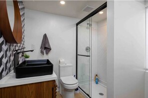 Hair dryer, towels, soap, toilet paper