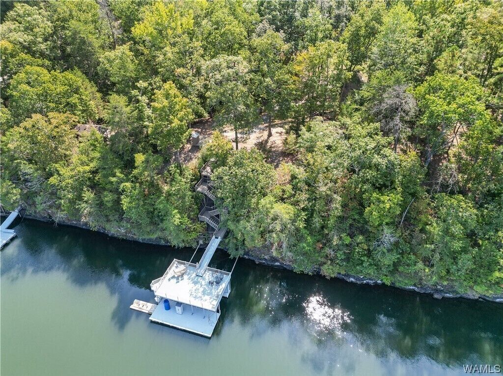 Lake Tuscaloosa home on two acres.  12 miles to University of Alabama.  