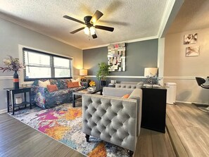 Smart TV, fireplace, books
