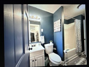 Hair dryer, towels, soap, shampoo