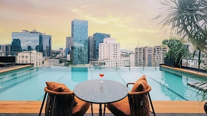 Outdoor pool, pool umbrellas, sun loungers