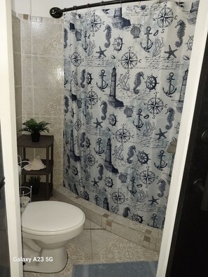 Hair dryer, towels, soap, shampoo