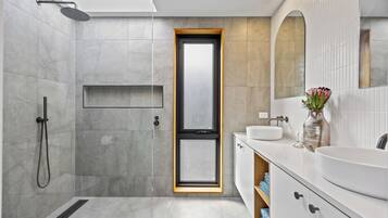 Shower, hair dryer, towels, soap