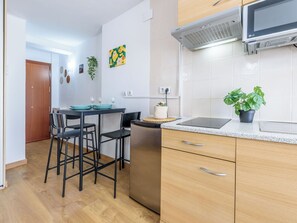 Fridge, microwave, cookware/dishes/utensils