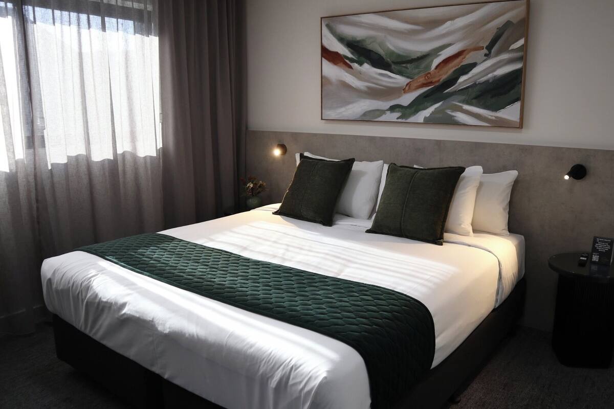 Premium bedding, pillowtop beds, desk, laptop workspace