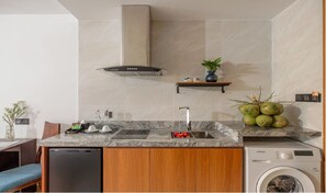 Mini-fridge, microwave, stovetop, cookware/dishes/utensils
