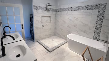 Hair dryer, towels, soap, shampoo