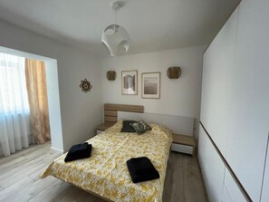 1 habitación, tabla de planchar con plancha, wifi y ropa de cama 