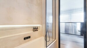 Hair dryer, towels, soap, shampoo