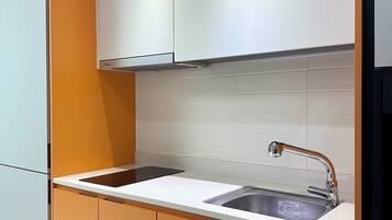 Fridge, microwave, cookware/dishes/utensils