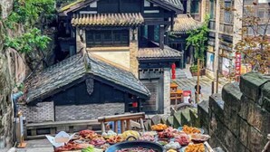 A traditional building with steeply pitched roofs and wooden structures. - Lavande Hotel (Chongqing Guanyinqiao Pedestrian Street) (Chongqing)