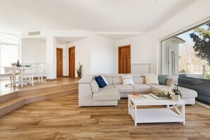 Luxury Apartment, 3 Bedrooms, Sea View | Living area | 32-inch flat-screen TV with digital channels - YourHome - Relais Barbara (Sorrento)