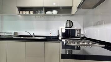 Fridge, microwave, stovetop, cookware/dishes/utensils