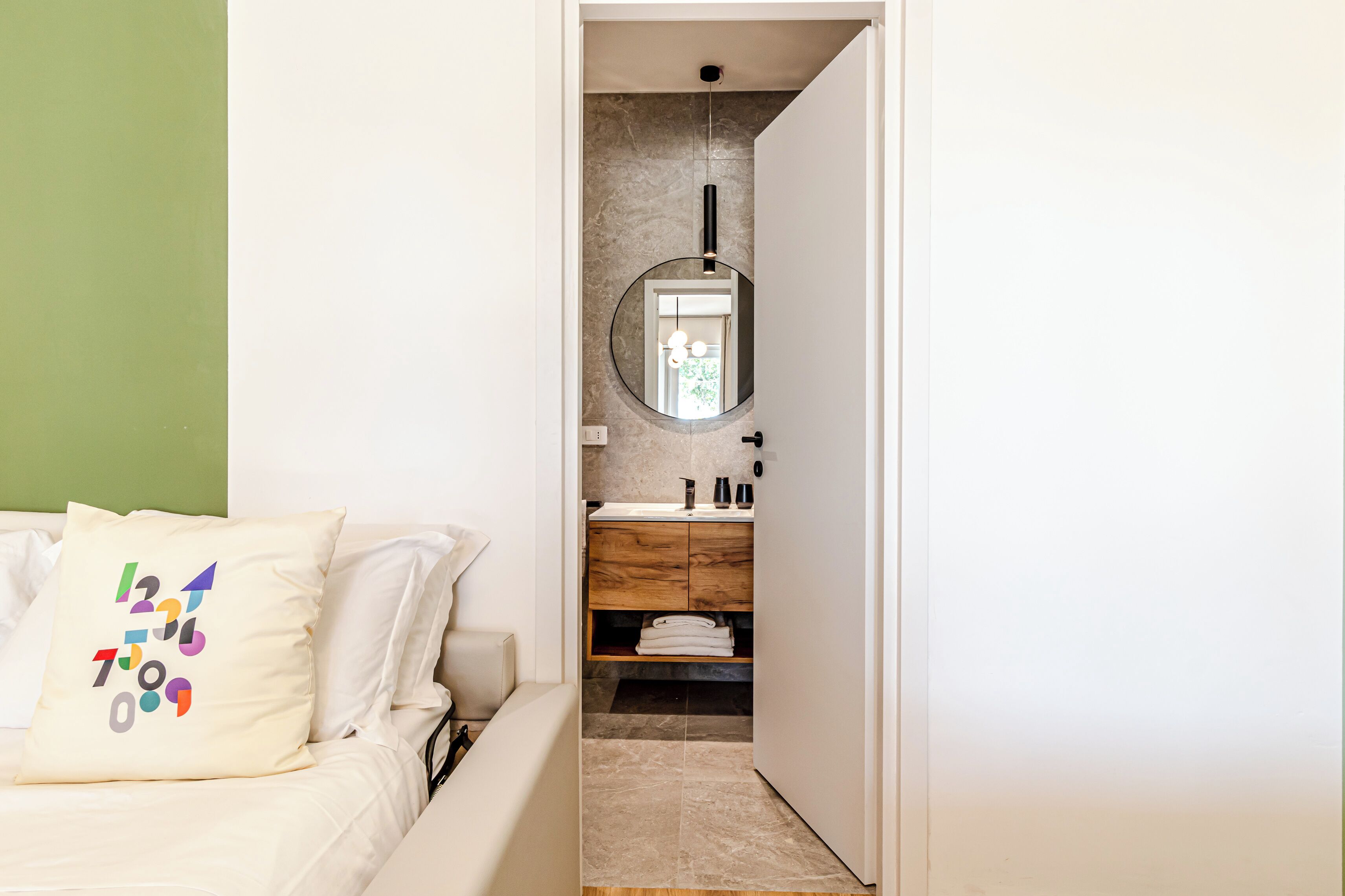 Family Quadruple Room, Private Bathroom | Minibar, in-room safe, desk, laptop workspace