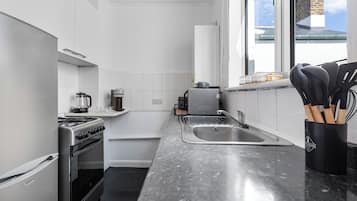 Apartment | Private kitchen | Fridge, microwave, oven, stovetop