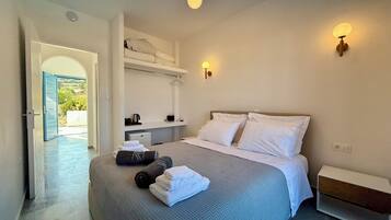 Habitación Deluxe, vistas al mar | Caja fuerte y wifi gratis