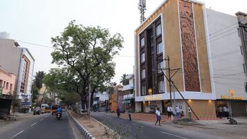 A building with a sign reading "VITHA GRAND".
