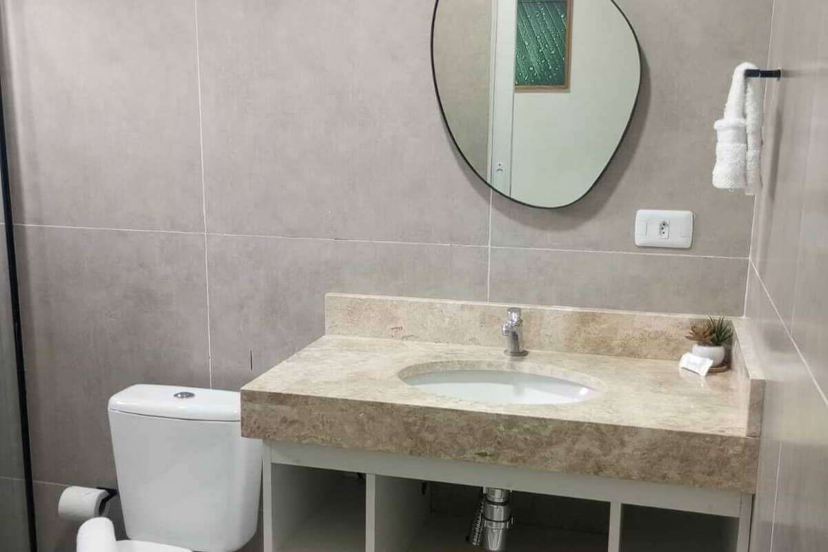 Shower, towels, soap, toilet paper
