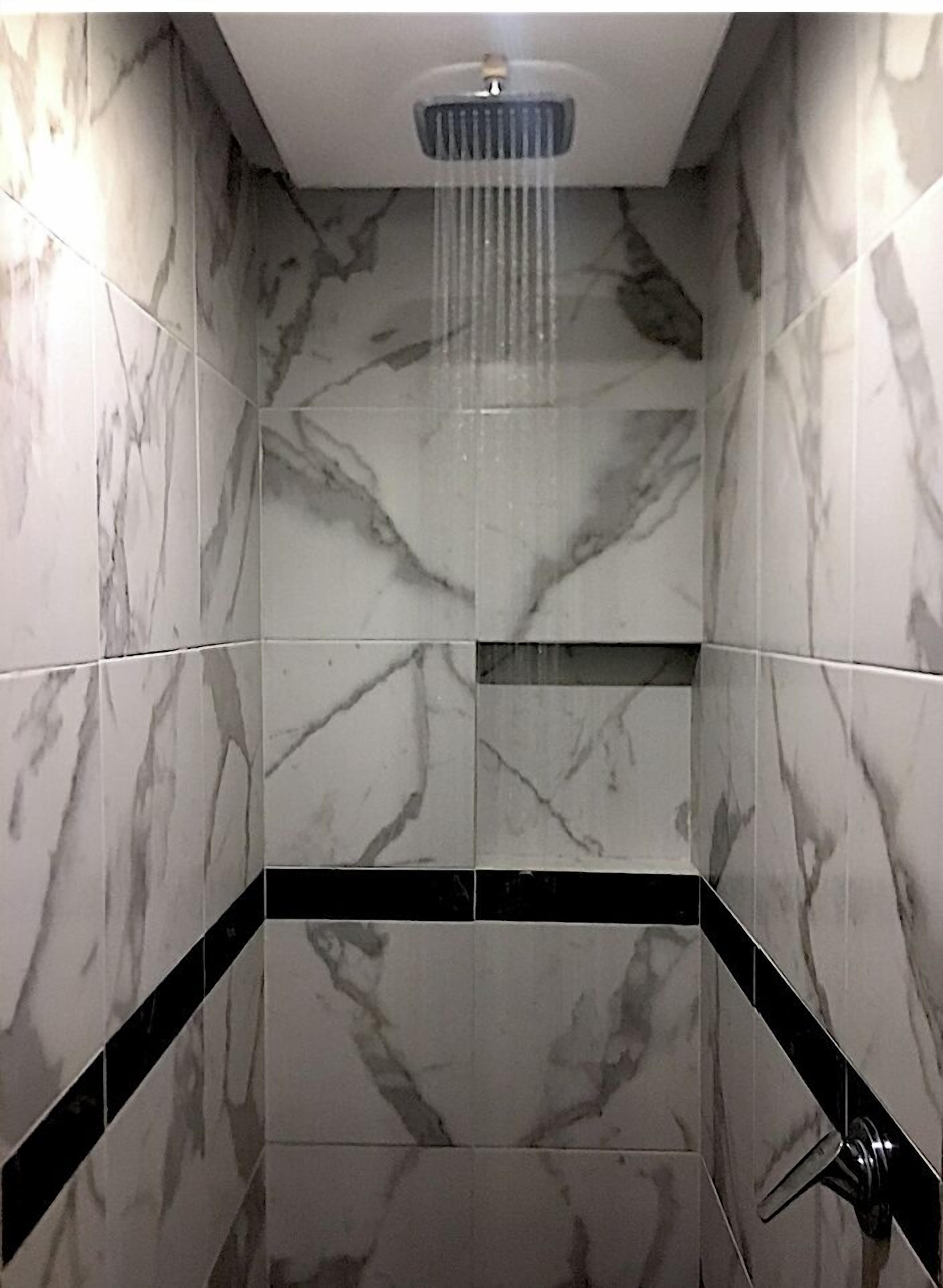 Shower, towels, soap, toilet paper