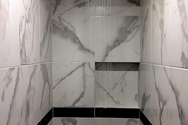 Shower, towels, soap, toilet paper