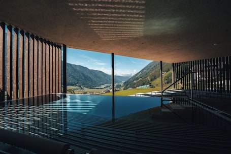 Indoor pool, a heated pool. Superb Apartement Large with View of the Dolomites