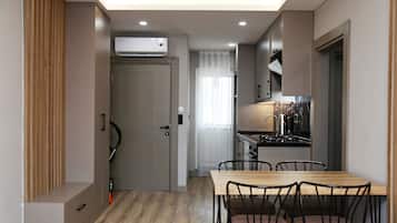 Suite, Balcony, Mountain View | Desk, laptop workspace, iron/ironing board, free WiFi