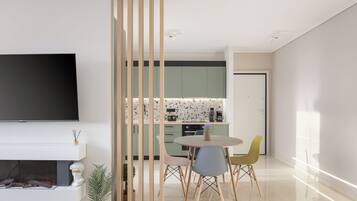 City Apartment | Living area | 55-inch Smart TV with digital channels