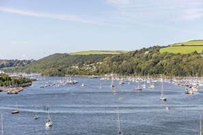 A marina with numerous boats and yachts docked. - The Masts 37 Dart Marina (Dartmouth)