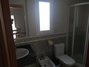 Shower, bidet, towels, soap