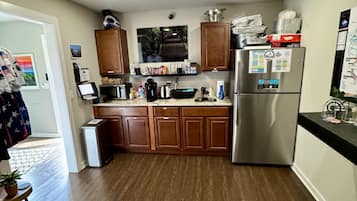 Fridge, microwave, dishwasher, coffee/tea maker