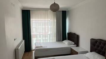 1 bedroom, desk, laptop workspace, blackout curtains