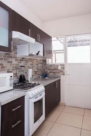 Family House, 2 Bedrooms, Patio, Garden View | Private kitchen | Electric kettle - Relaxing Cancun Pools Soccer & BBQ Area (Cancun)