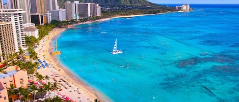 Beach nearby, white sand, sun loungers, beach umbrellas