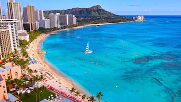 Beach nearby, white sand, sun loungers, beach umbrellas