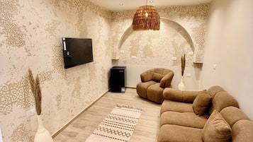 Habitació quàdruple Comfort | Roba de llit d'alta qualitat, cobrellits i minibar