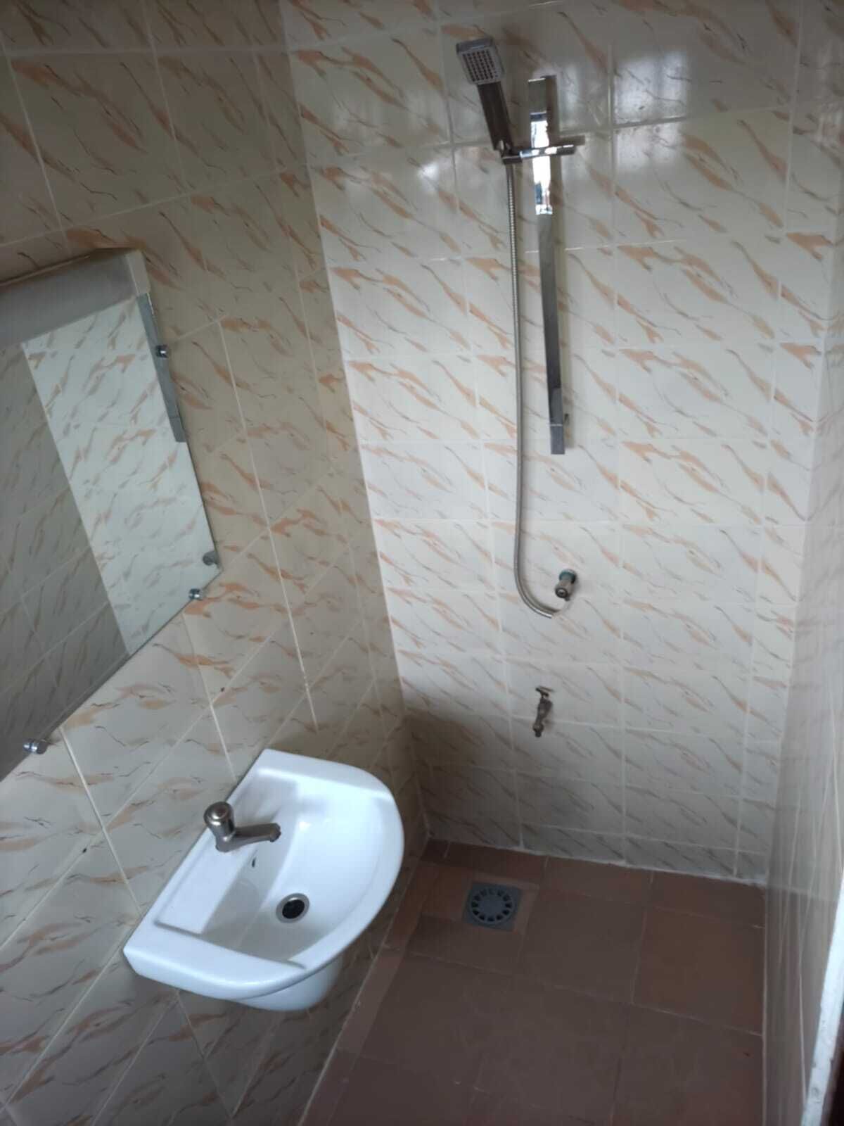 Shower, towels, soap, toilet paper