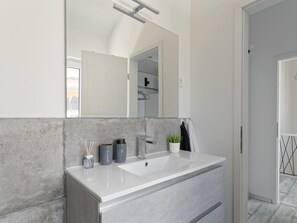 Hair dryer, towels, soap, toilet paper