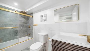 Hair dryer, towels, soap, shampoo