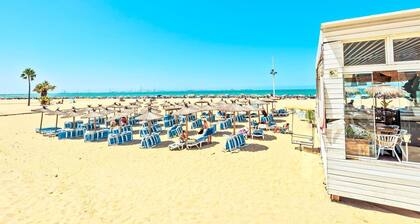 Beachfront 3-BR apartment with sea view and pool view balconies, swimming pools