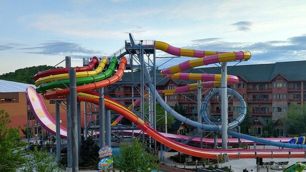 A water park with multiple slides and a pool area. - 2 Bedroom Deluxe Suite in Great Smokies Lodge! (Sevierville)