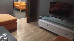 Loft Deluxe, balcon, vue ville | Coin séjour