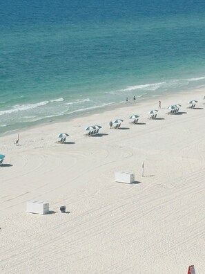 On the beach, sun loungers