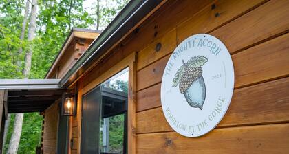 The Mighty Acorn, Bungalow is a delightful cozy tiny home in the woods.