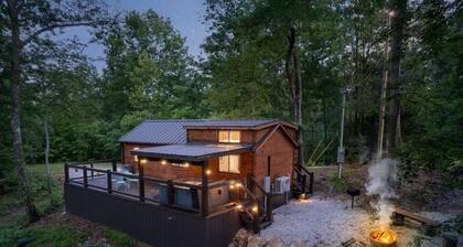 The Mighty Acorn, Bungalow is a delightful cozy tiny home in the woods.