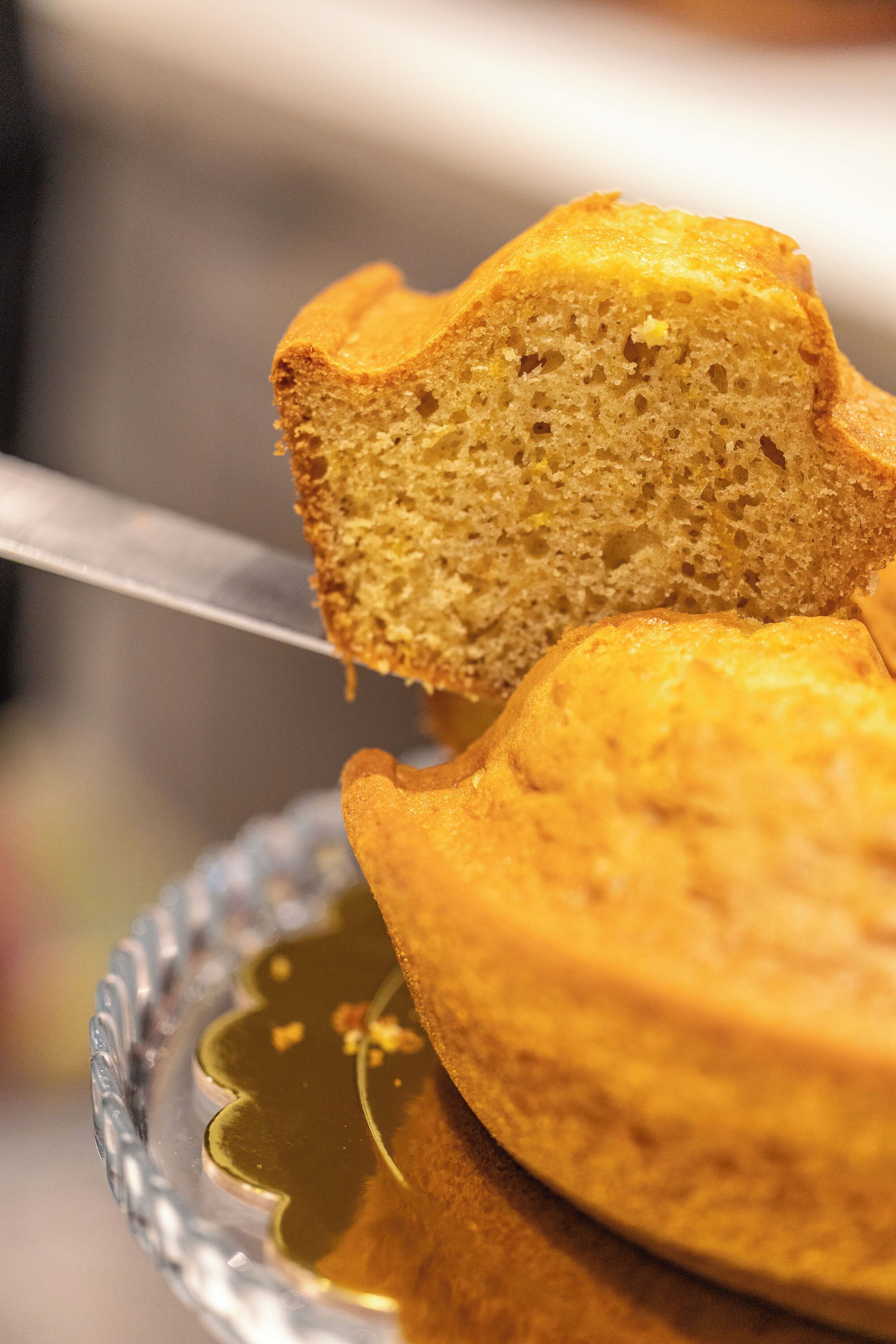 A cake with a knife in it.