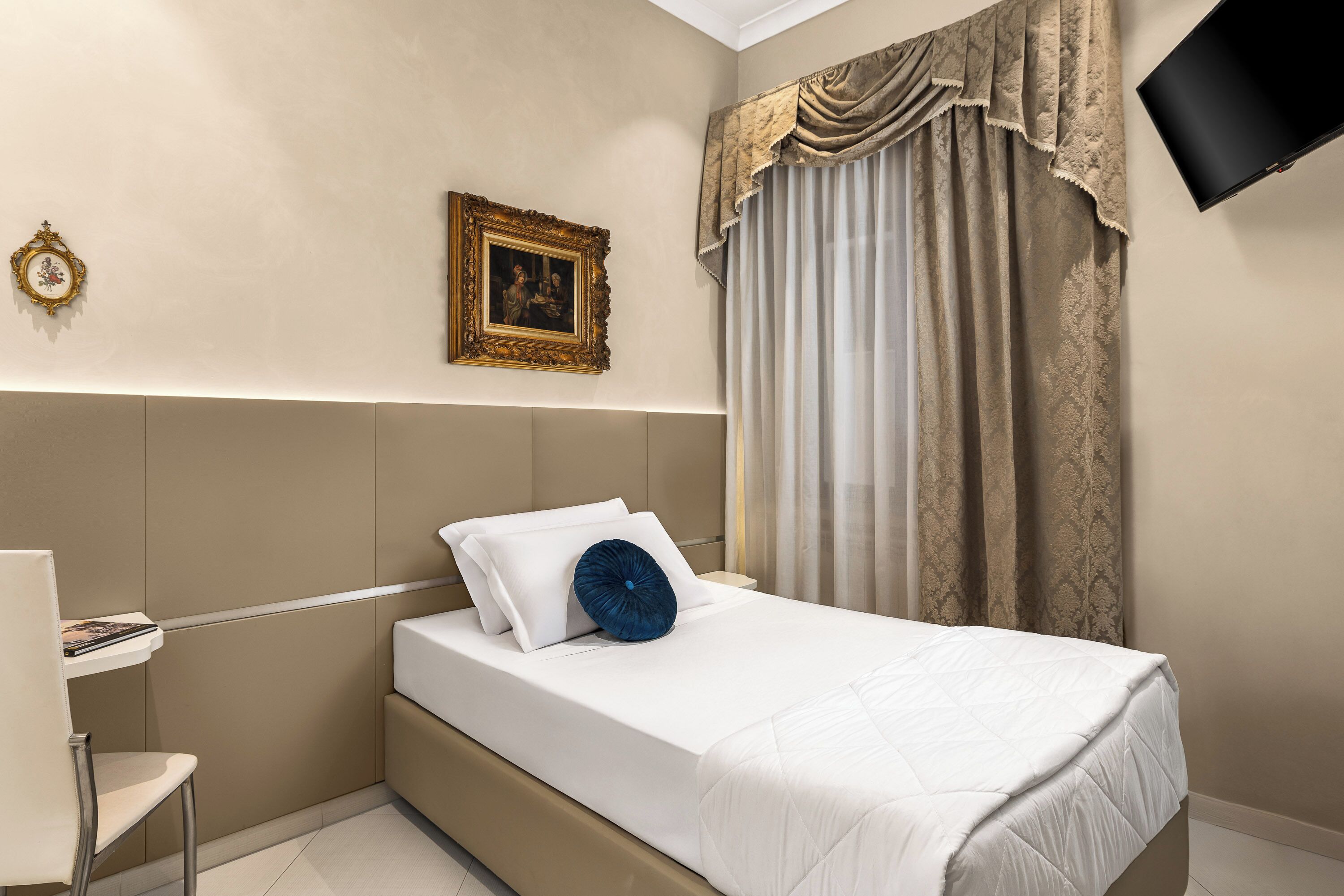 Hypo-allergenic bedding, down duvets, memory-foam beds, in-room safe