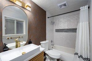 Hair dryer, towels, soap, toilet paper