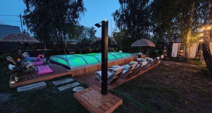 Charming 3-bedroom cottage in ChrzanĂłw with AC, hot tube, heated pool and sauna