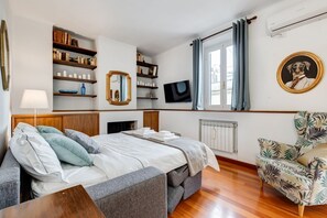 1 bedroom, desk, iron/ironing board, travel cot