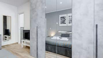 1 habitación, tabla de planchar con plancha, cuna de viaje y wifi